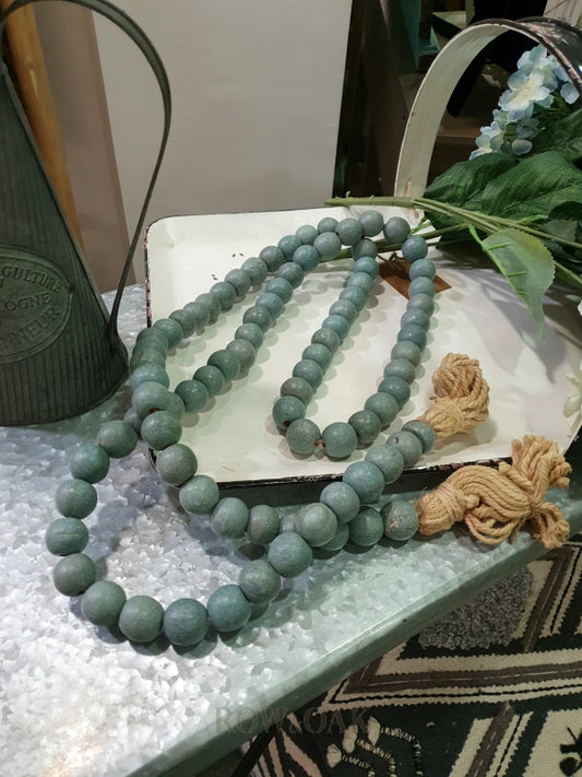 Strand Of Teal Wood Beads