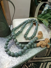 Load image into Gallery viewer, Strand Of Teal Wood Beads